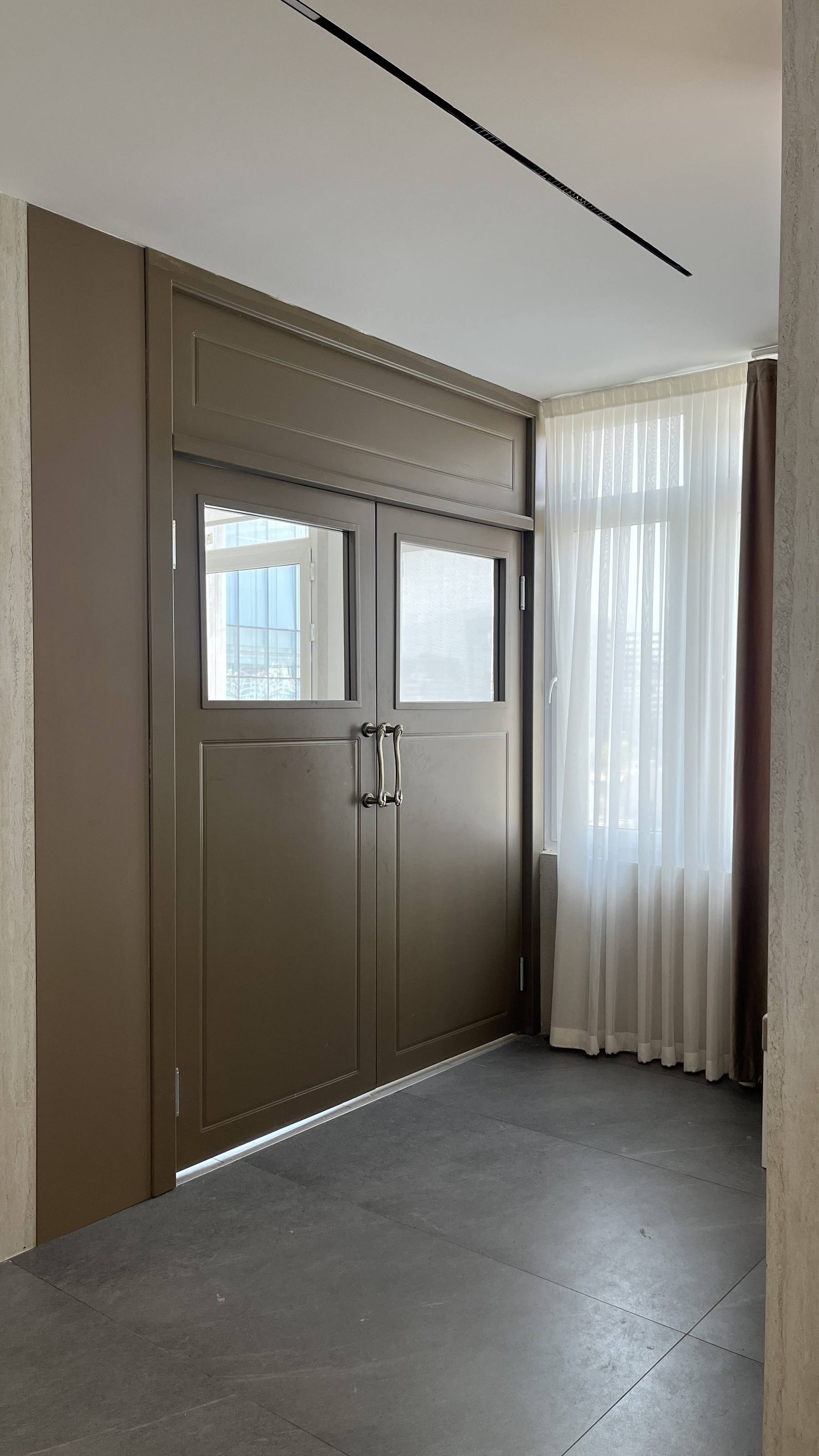 Service door — brown lacquer with glass