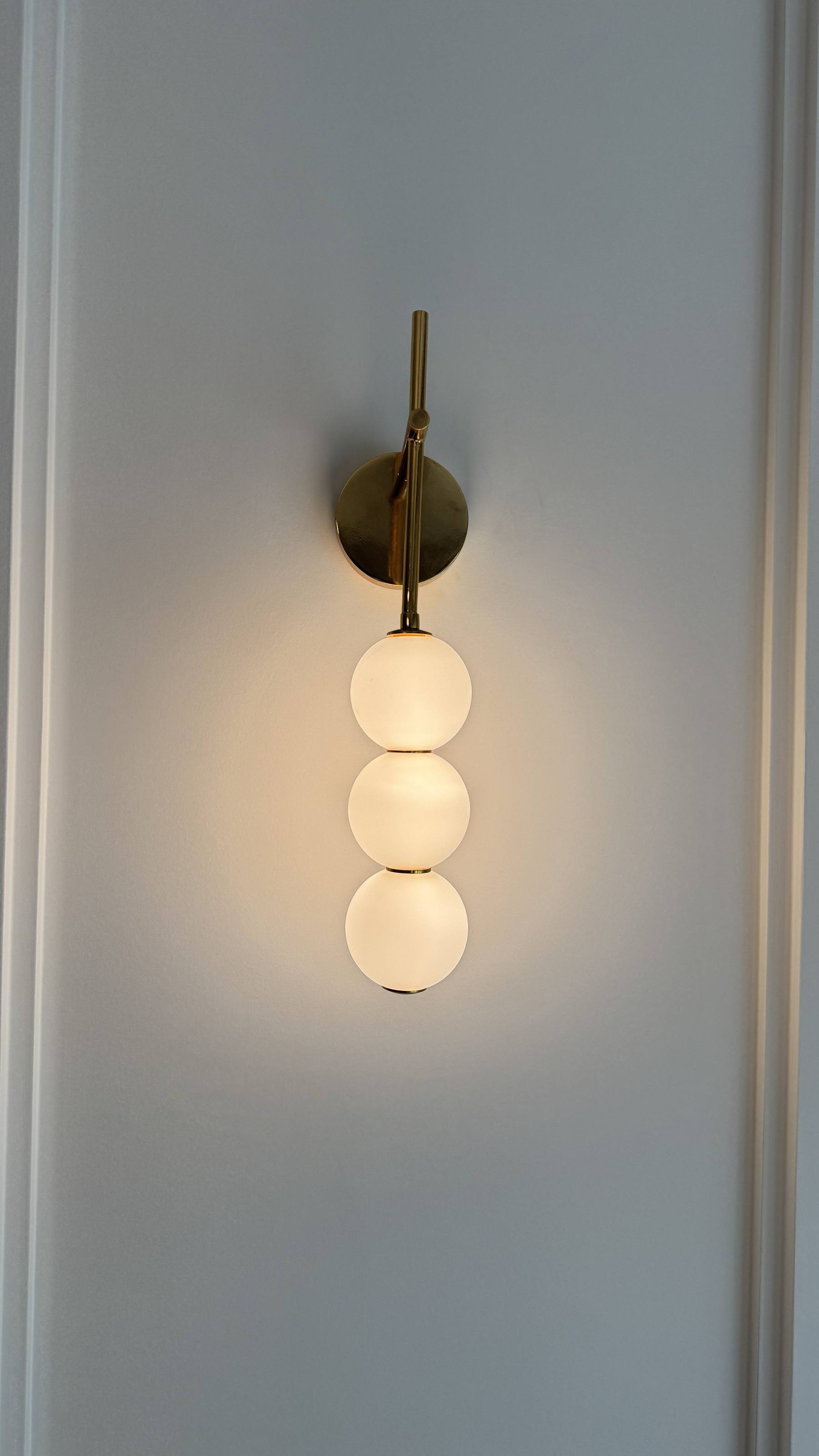 Brass wall sconce